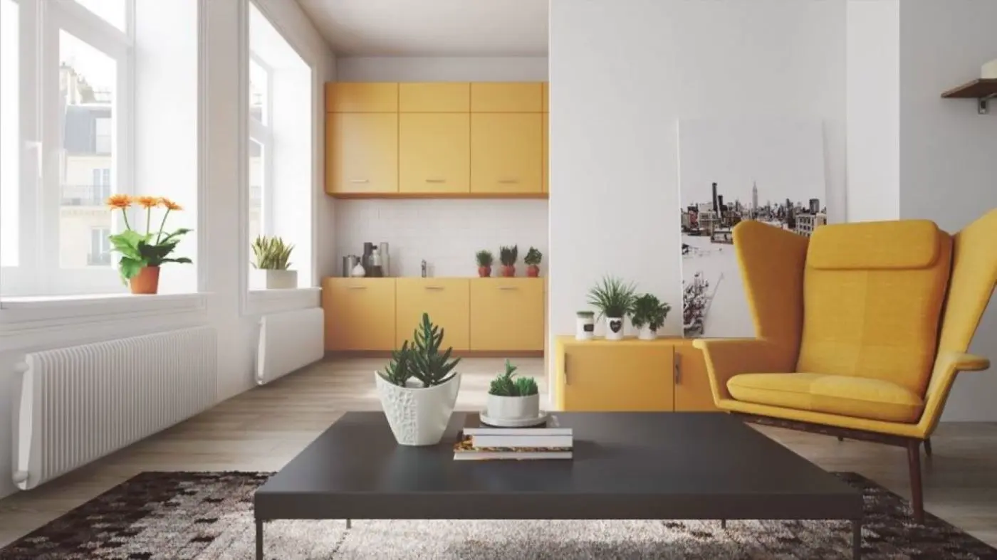 Using yellow as an accent color in a living room Scandinavian-style