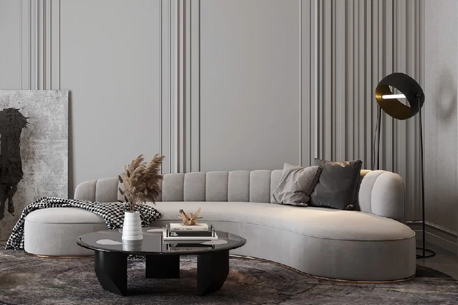 Sofas upholstered in high-quality leather or fabric with neutral colors such as white, gray, and beige